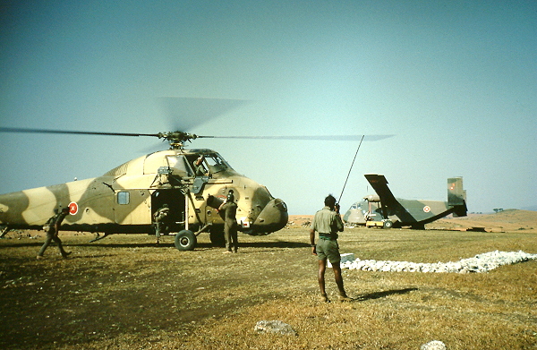 Wessex helicopter and crashed Skyvan at Tawi